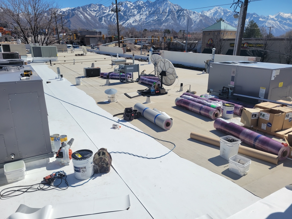 photo of a commerical roof repair in progress by Liberty Roofing