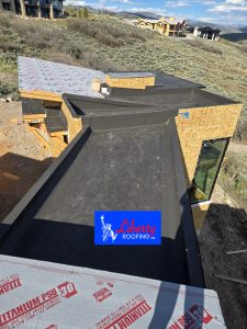 Bronze TPO roof seam detail on luxury new construction roofing project near Park City Utah