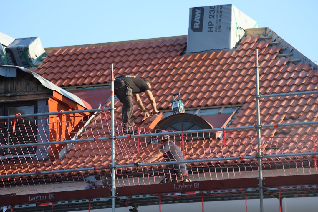 Residential roof repair work illustrating roof decking repair in Utah